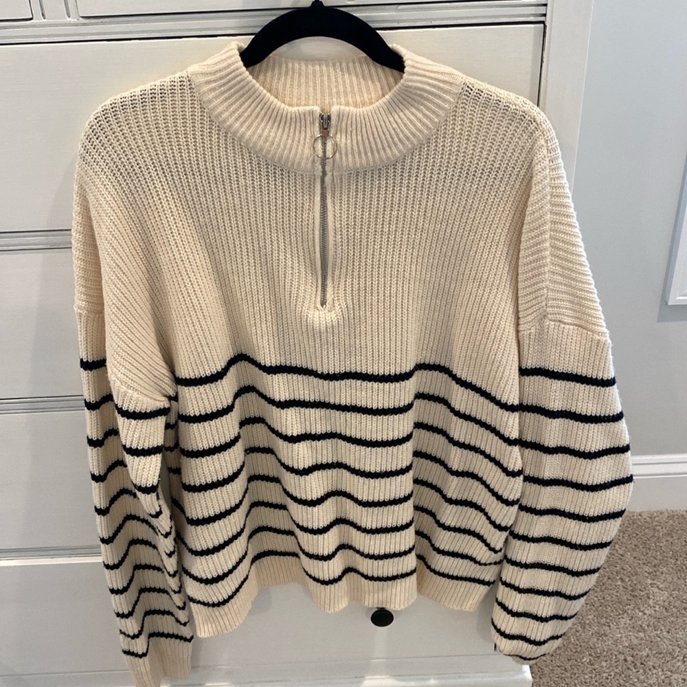 Cream and black quarter-zip sweater